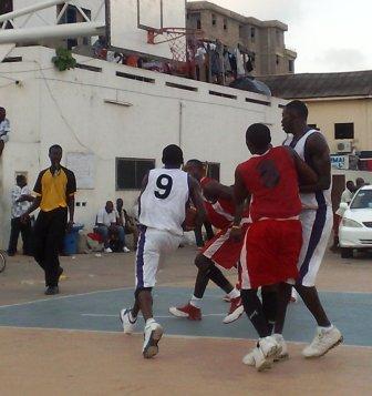 Emeric takes it to the basket after a pick set by Charles